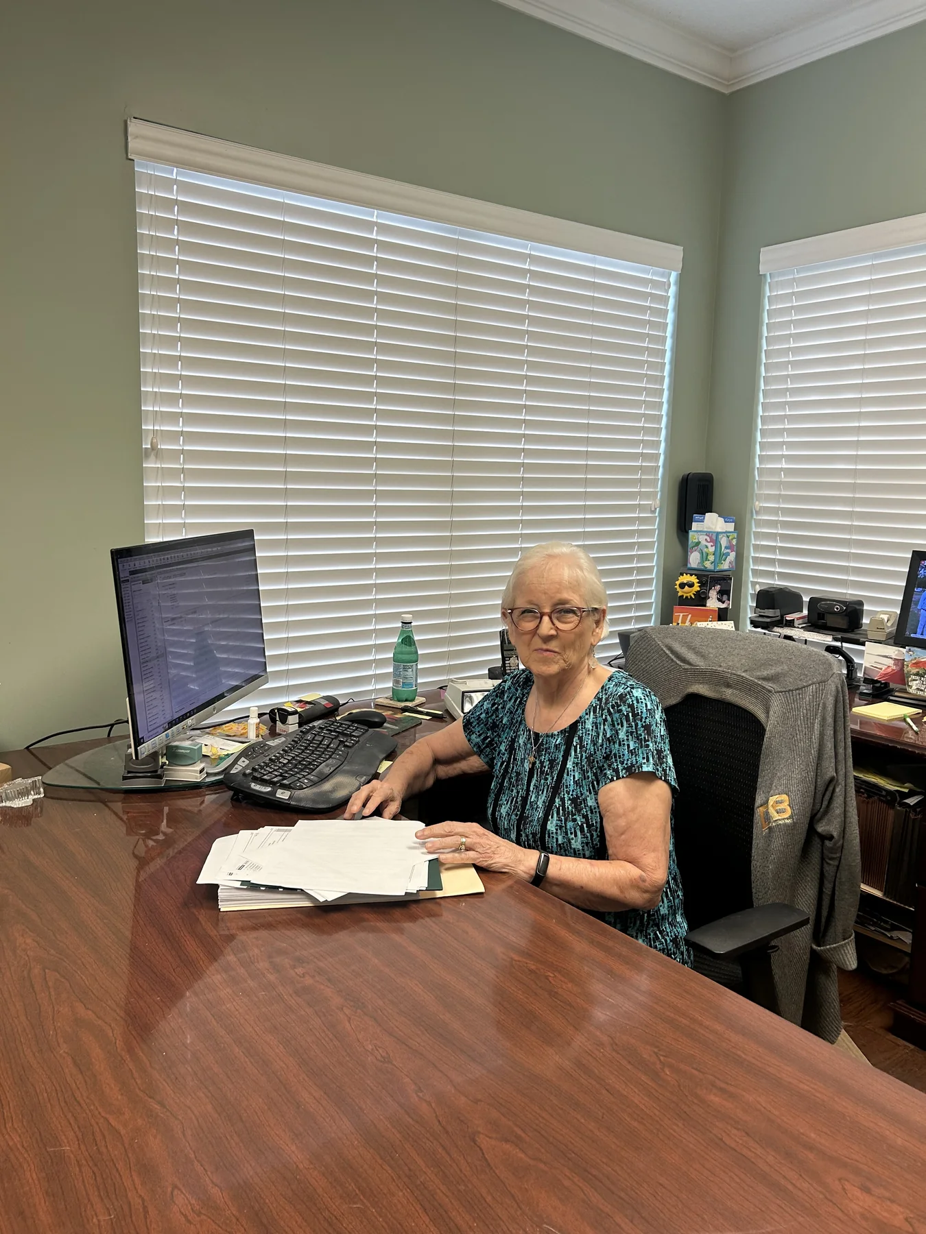 Dianne Briery seated at her desk in her office